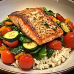 Pan-Seared Salmon on Garlic Veggie Rice Bowl